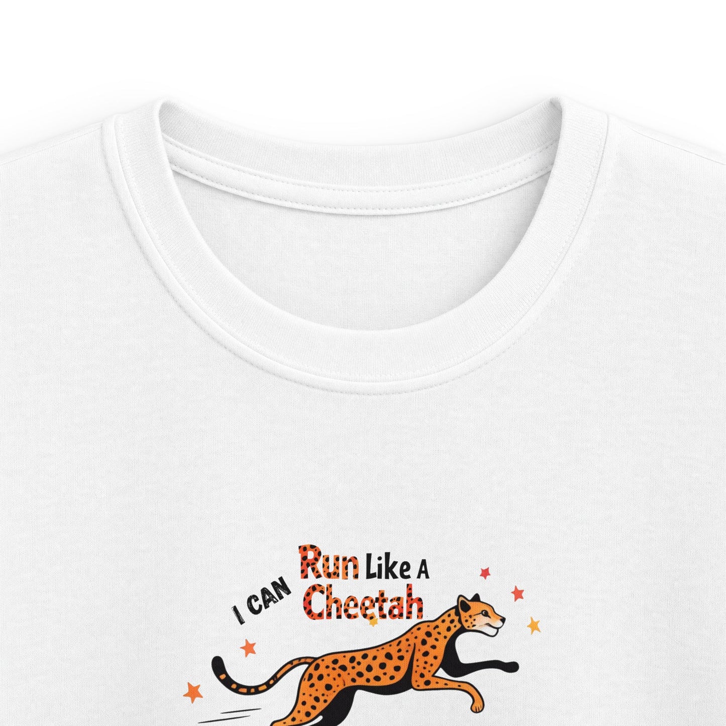 White crewneck t-shirt featuring a graphic of a running cheetah with the text 'I CAN Run Like A Cheetah' in orange and black lettering.