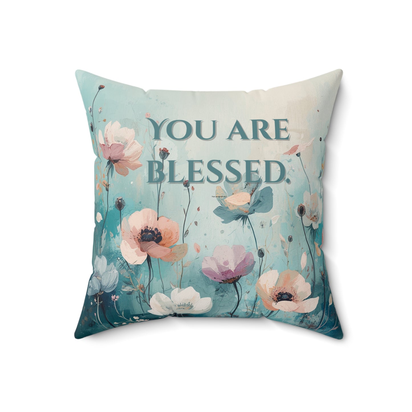 Decorative pillow with floral design and 'You are Blessed' text on a white background