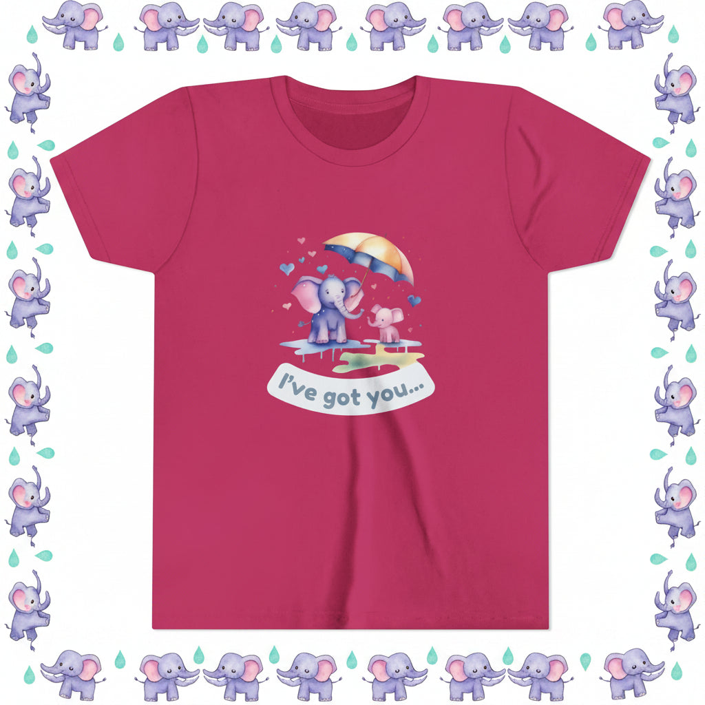 Pink t-shirt with cartoon design of an elephant and dog under an umbrella, text 'I've got you...', on a white background.