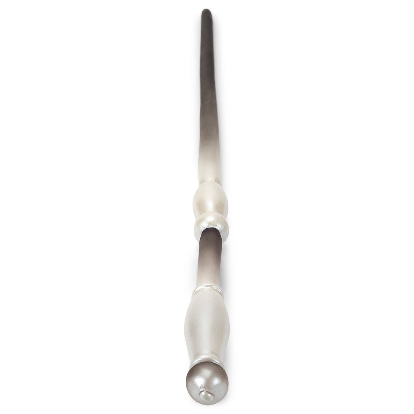 Metallic tool with a cylindrical handle and pointed end on a white background Toy 'magic wand'.