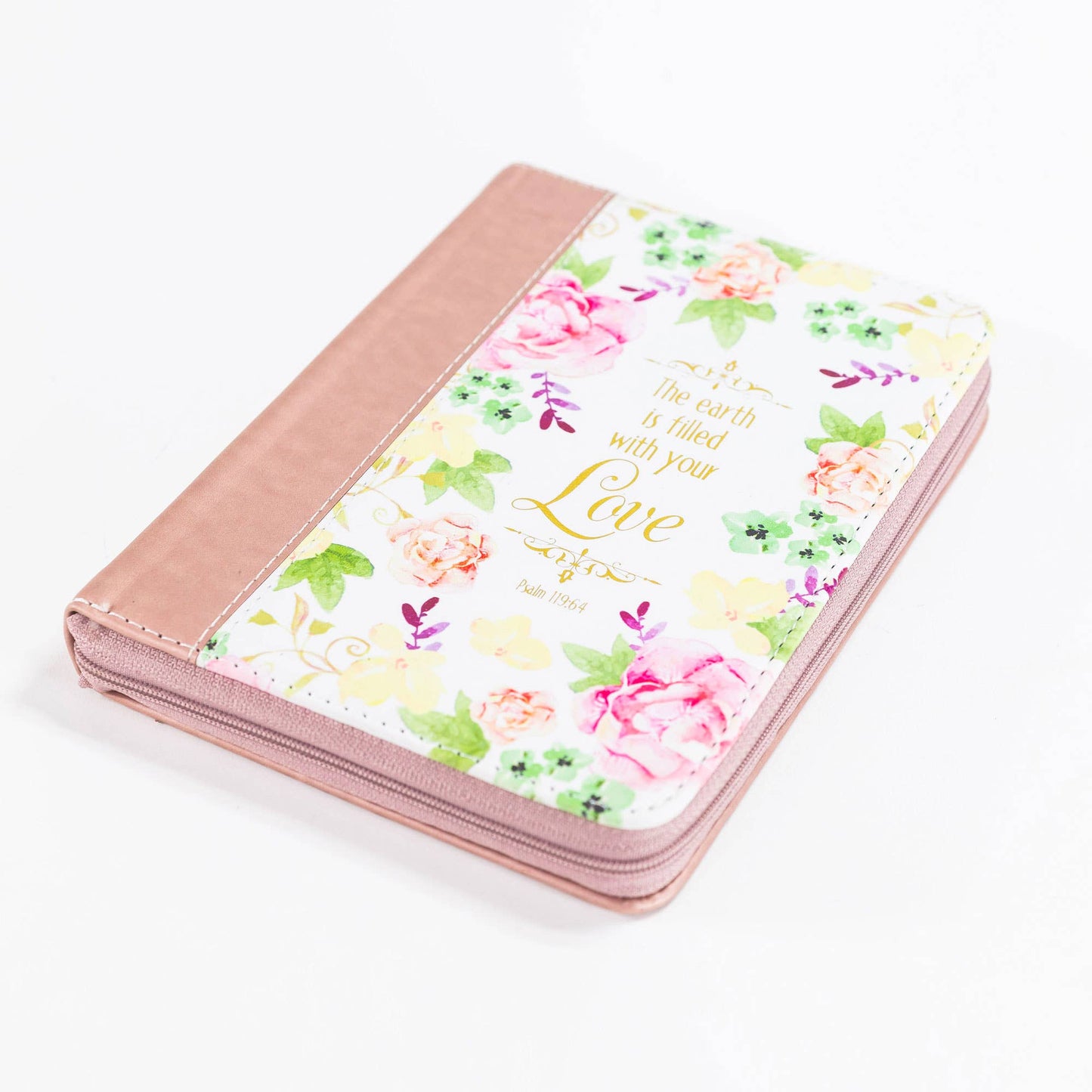 Floral notebook with pink cover on a white background