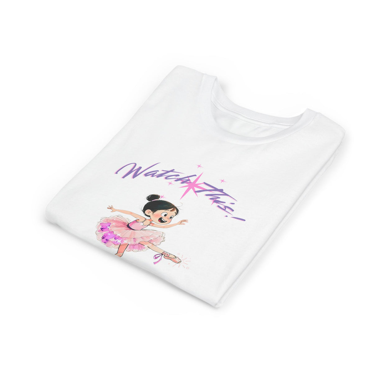 A folded white t-shirt on a clean white background, featuring a cartoon illustration of a ballerina in a pink tutu with the purple text 'Watch This!' printed on the front.