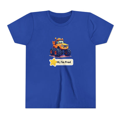 A royal blue short-sleeve crewneck t-shirt featuring a cartoon graphic of an orange and yellow monster truck with a speech bubble that reads 'Hi, I'm Fred'.