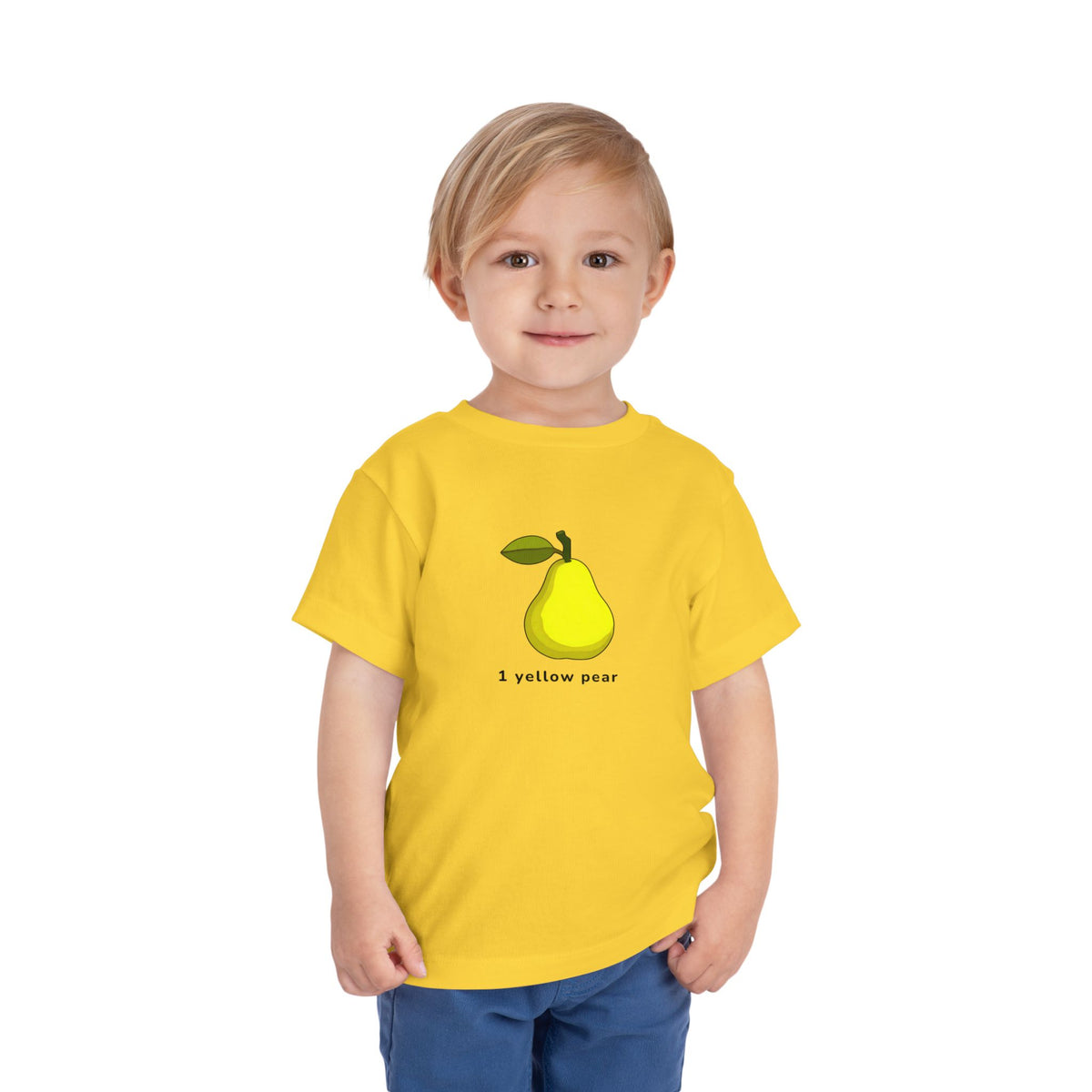Child wearing a yellow t-shirt with colorful graphics on a white background