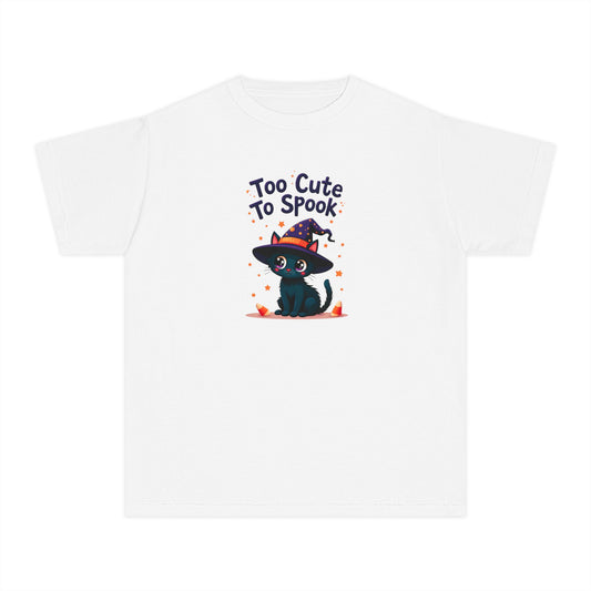 A white short-sleeve crewneck t-shirt featuring a cute graphic of a black cat wearing a witch hat with the text 'Too Cute To Spook' above it.