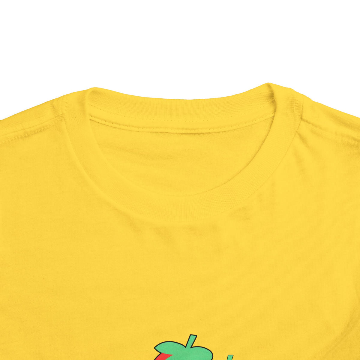 Close-up of a bright yellow crewneck t-shirt showing the inner collar and the top of a green apple graphic with a red bite taken out, on a white background.