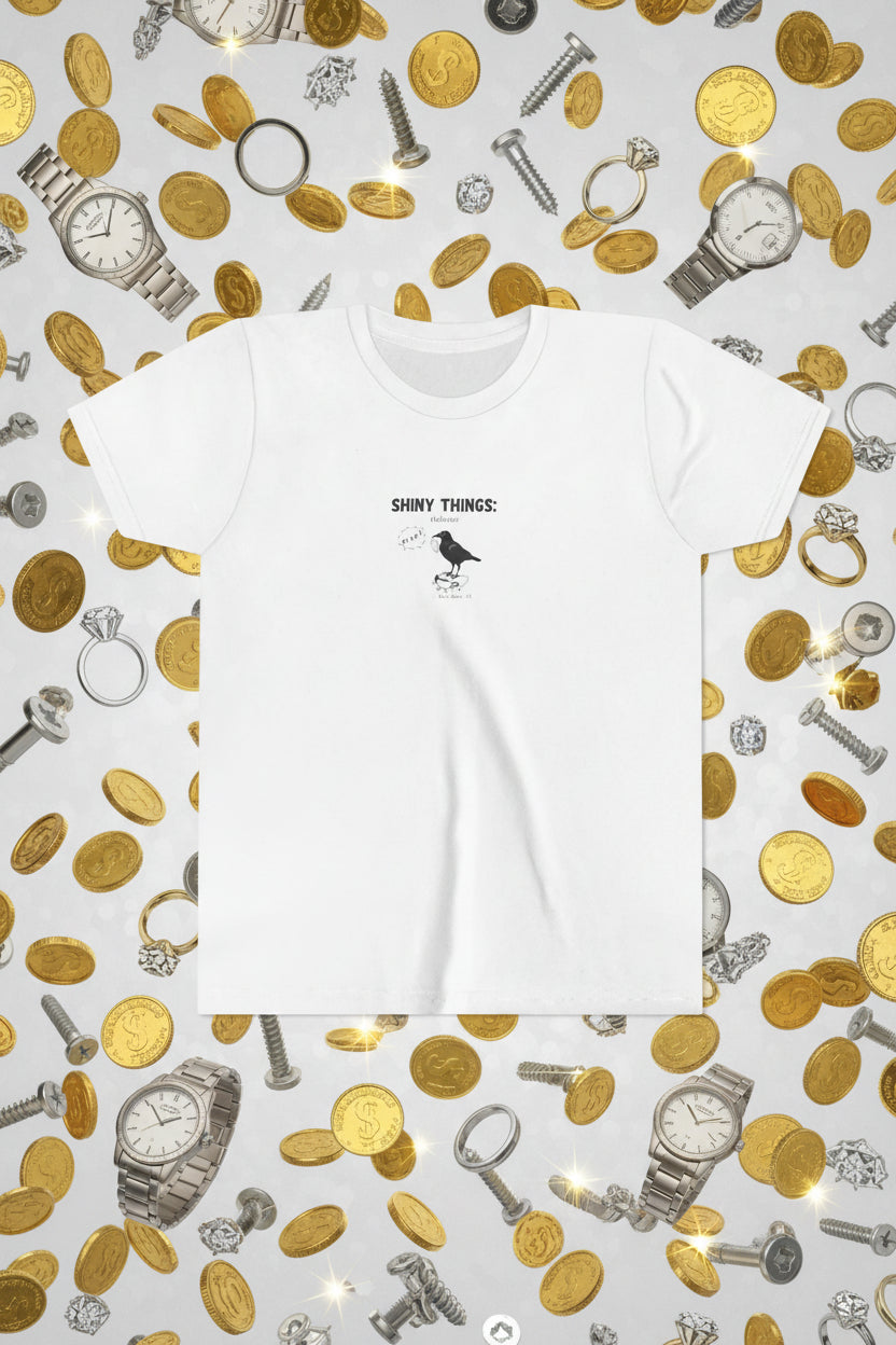 White t-shirt with a small graphic and text on a cartoon  background