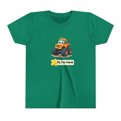 A green short-sleeve crewneck t-shirt featuring a cartoon graphic of a cheerful yellow/ orange monster tires truck with the text 'Hi, I'm Hank' on a yellow star banner.