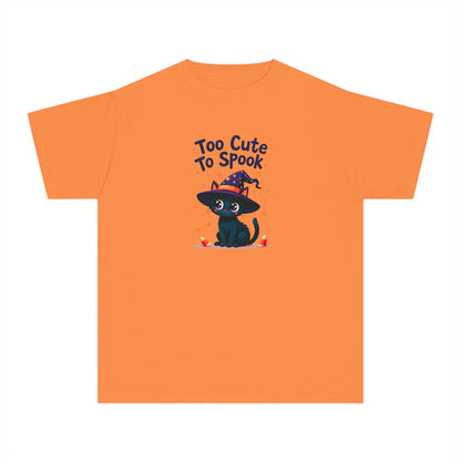 An orange short-sleeve crewneck t-shirt featuring a cartoon graphic of a cute black cat wearing a witch hat with the text 'Too Cute To Spook' printed on the chest.