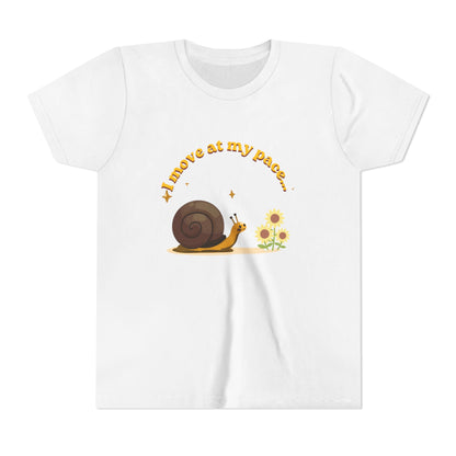 White t-shirt with a snail graphic and text on a white background