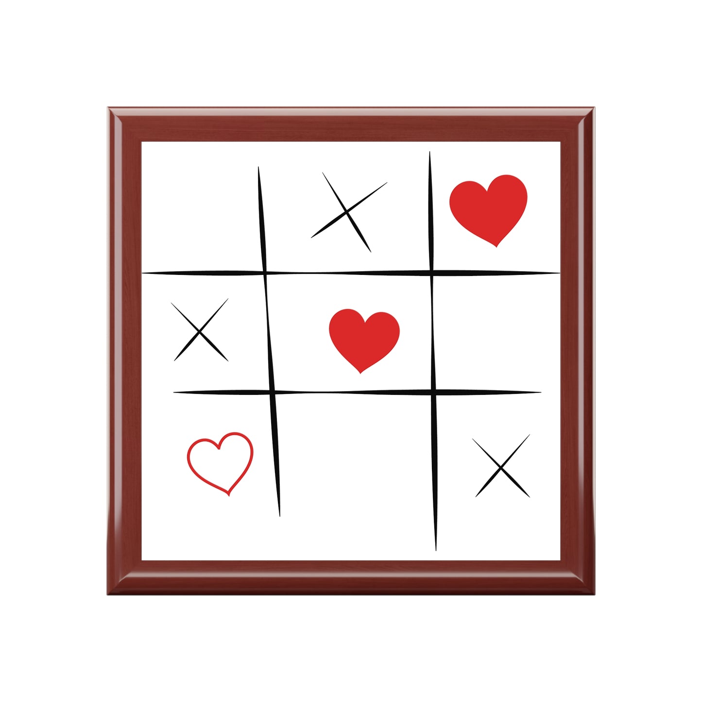 Tic-tac-toe board with hearts and 'X' marks inside a brown frame top of a jwery box on a white background
