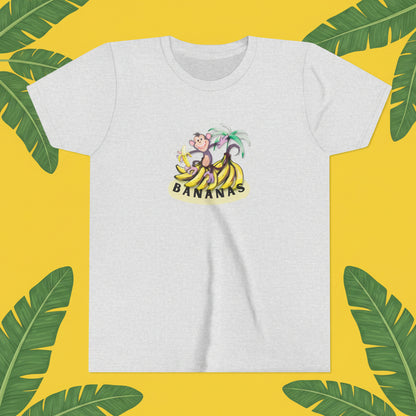 Ash grey tee with graphic cartoon monkey on bunches of bananas with cartoon background
