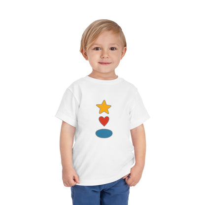 Child wearing a white t-shirt with 'mini surfer' text and graphic on a white background