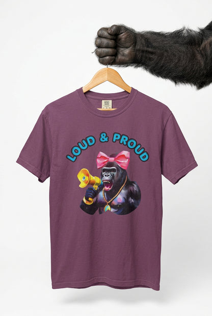 “Girl‑Girl™ cheerleader gorilla with pink bow and megaphone on a white unisex tee with the phrase ‘Loud & Proud.’”