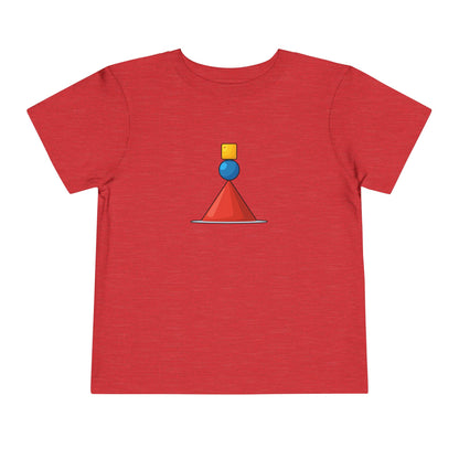 A red short-sleeve crewneck t-shirt featuring a small geometric graphic on the chest with a yellow square, blue circle, and orange cone.