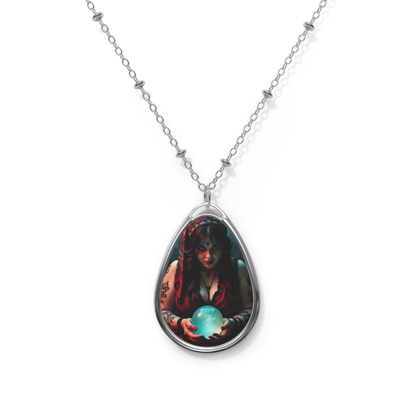 Teardrop-shaped pendant with a fantasy design on a white background