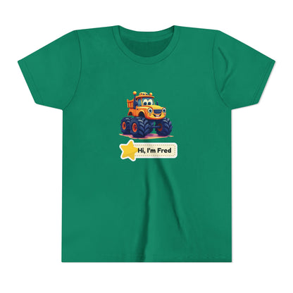 A green short-sleeve crewneck t-shirt featuring a cartoon graphic of a yellow and blue monster truck with a star badge that reads 'Hi, I'm Fred'.