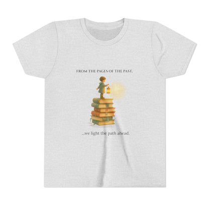 Ash t-shirt with a graphic of a child standing on books holding a lantern, surrounded by text on a white background.
