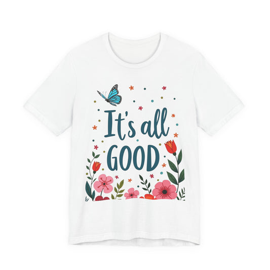 White t-shirt with 'It's all good' text and floral design on a white background