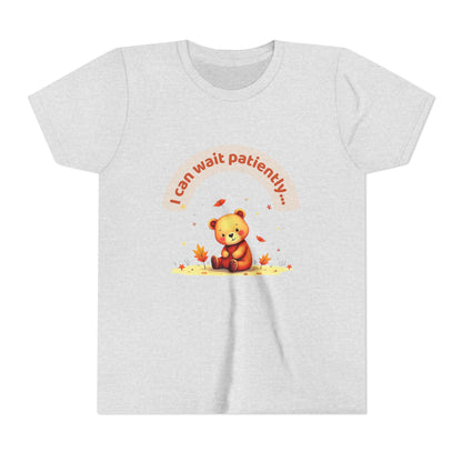 White t-shirt with a teddy bear graphic and text on a white background