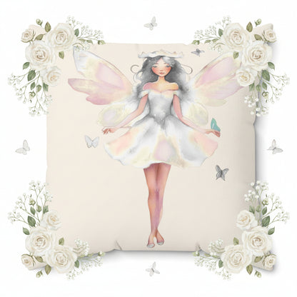 Cream Decorative pillow with a white fairy design on a white background