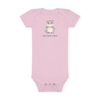 Pink baby onesie with a cartoon hippo and text on a white background