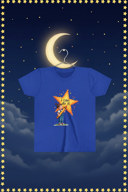 Blue t-shirt with a cartoon character holding a crayon and 'I can do it' text on a white background
