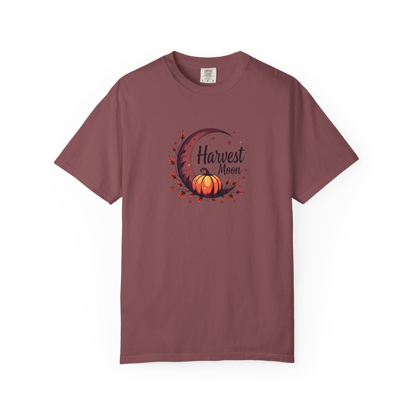 An expresso short-sleeve crewneck t-shirt featuring a central graphic of a crescent moon, autumn leaves, a pumpkin, and the text 'Harvest Moon' in black script.