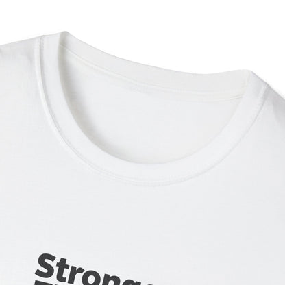 Close-up of a white crew-neck t-shirt showing the inner collar and the top of a black printed graphic that reads 'Strong'.