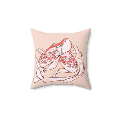 Decorative pillow with a pink and white abstract design on a beige background