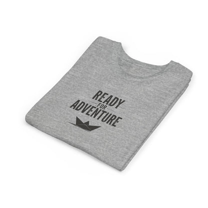 Kids folde grey T‑shirt with bold black “Ready for Adventure” text and a small paper boat graphic.