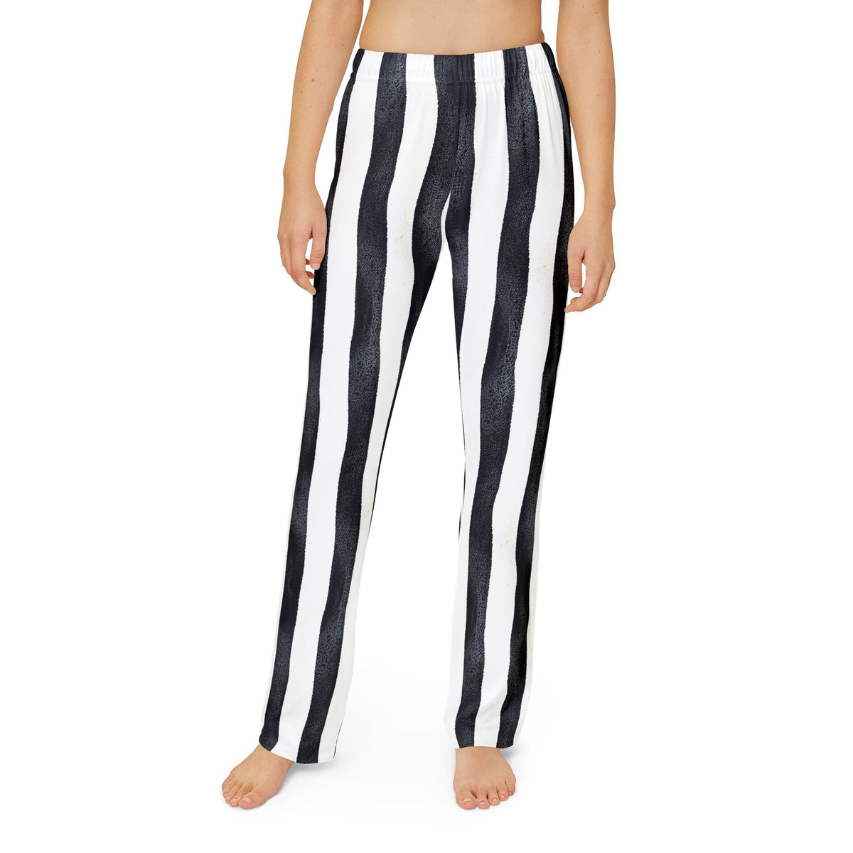 Kids black‑and‑white striped pants with a slight wiggle pattern for a playful pirate look.