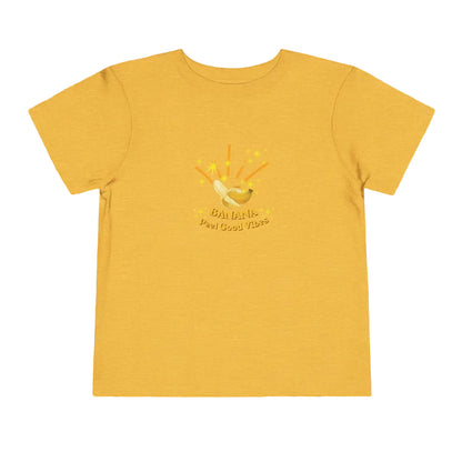 Yellow t-shirt with a graphic design on a fun cartoon background