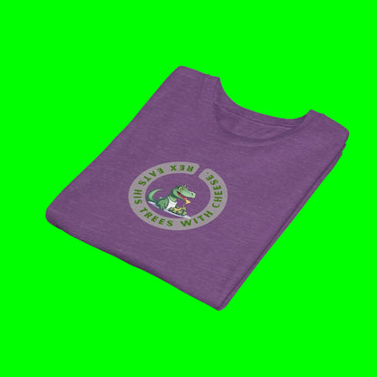  folded purple t-shirt with a circular graphic on the chest featuring a cartoon green alligator and the text 'REX EATS HIS TREES WITH CHEESE'.