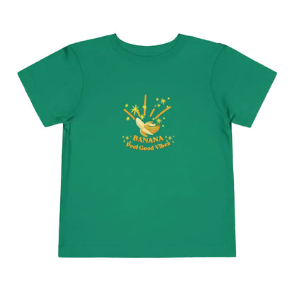A cute green toddler T-shirt with “Banana Peel Good Vibes” sparkling banana graphics on a white background.
