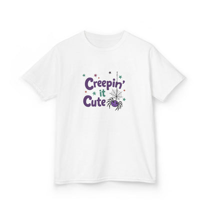 A white short-sleeve crewneck t-shirt featuring a 'Creepin' it Cute' graphic with a spider and stars on the chest, displayed against a solid white background.