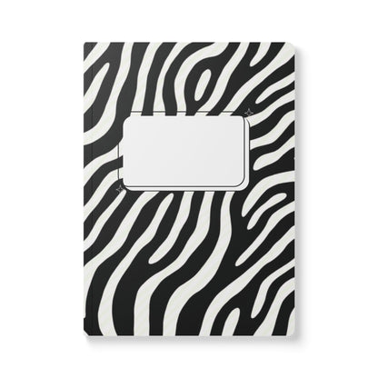 Notebook with zebra pattern cover on a white background