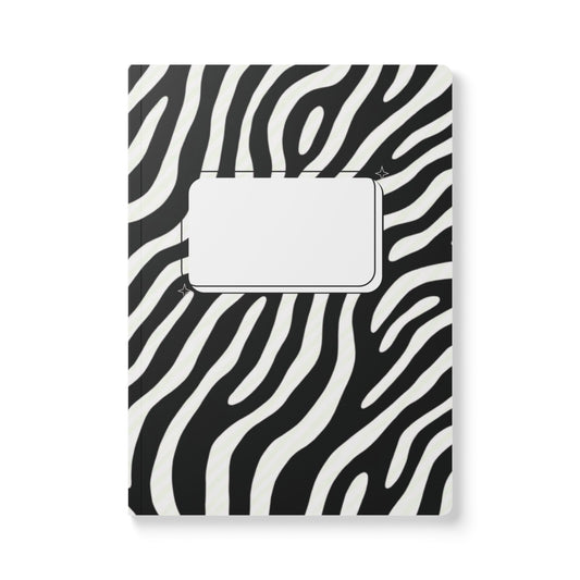Notebook with zebra pattern cover on a white background