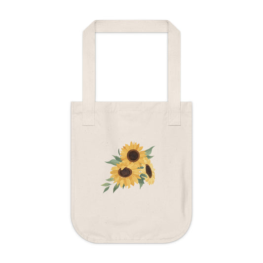Natural beige tote bag with artistic sunflower design on a white background