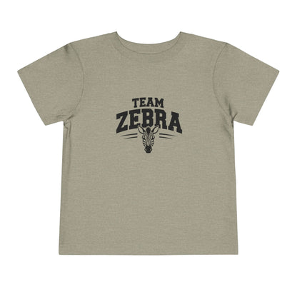 Beige t-shirt with 'Team Zebra' lettering and zebra graphic on a white background