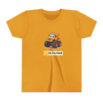 A yellow mustard  short-sleeve crewneck t-shirt featuring a cartoon graphic of a cheerful yellow/ orange tractor with the text 'Hi, I'm Hank' printed on the front, displayed against a solid white background.