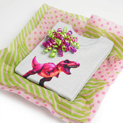 A folded t-shirt featuring a large magenta dinosaur inside a gift box with colrofgul tissue paper and curlc ribbon.
