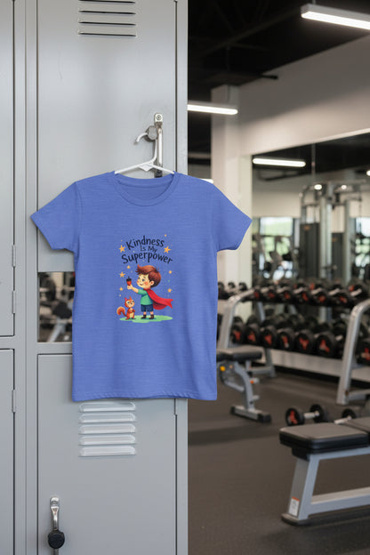 Blue t-shirt with a child and squirrel illustration and 'Kindness is my superpower' text on a white background