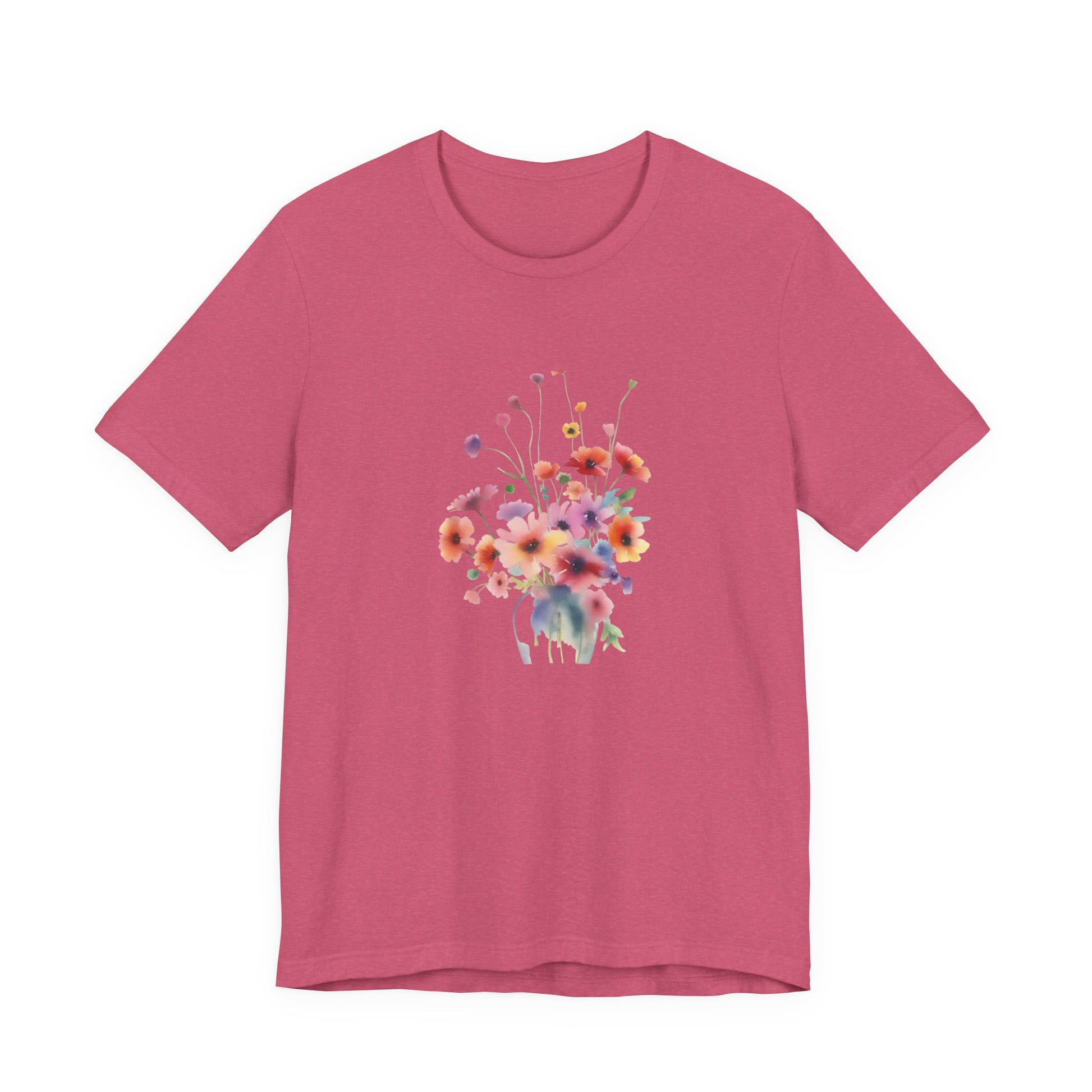 Pink t-shirt with a colorful floral design on a white background