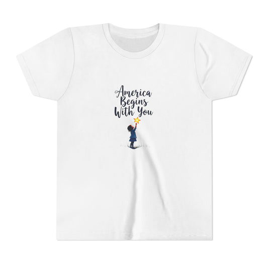 White t-shirt with 'America Begins With You' text and graphic on a white background