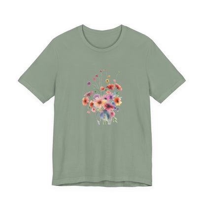 Green t-shirt with a colorful floral design on a white background