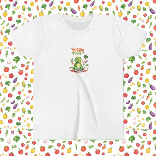 A white short-sleeve crewneck t-shirt featuring a colorful cartoon graphic of a green vegetable-themed influential dinosaur/ aligator with the text 'Veggie Power' printed above it.