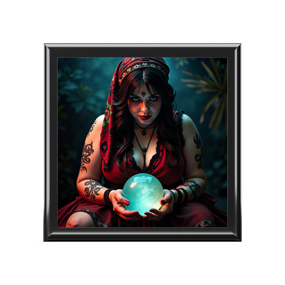 A jewelry box with framed artwork of a woman holding a glowing blue crystal ball with a dark, mystical background.