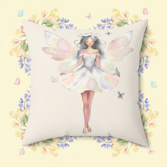 Cream Decorative pillow with a white fairy design on a white background