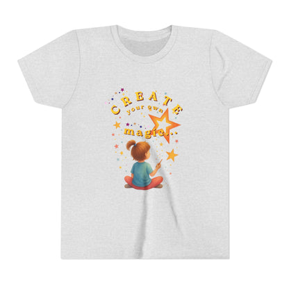 Ash t-shirt with a colorful graphic and text 'Create your own magic' on a white background